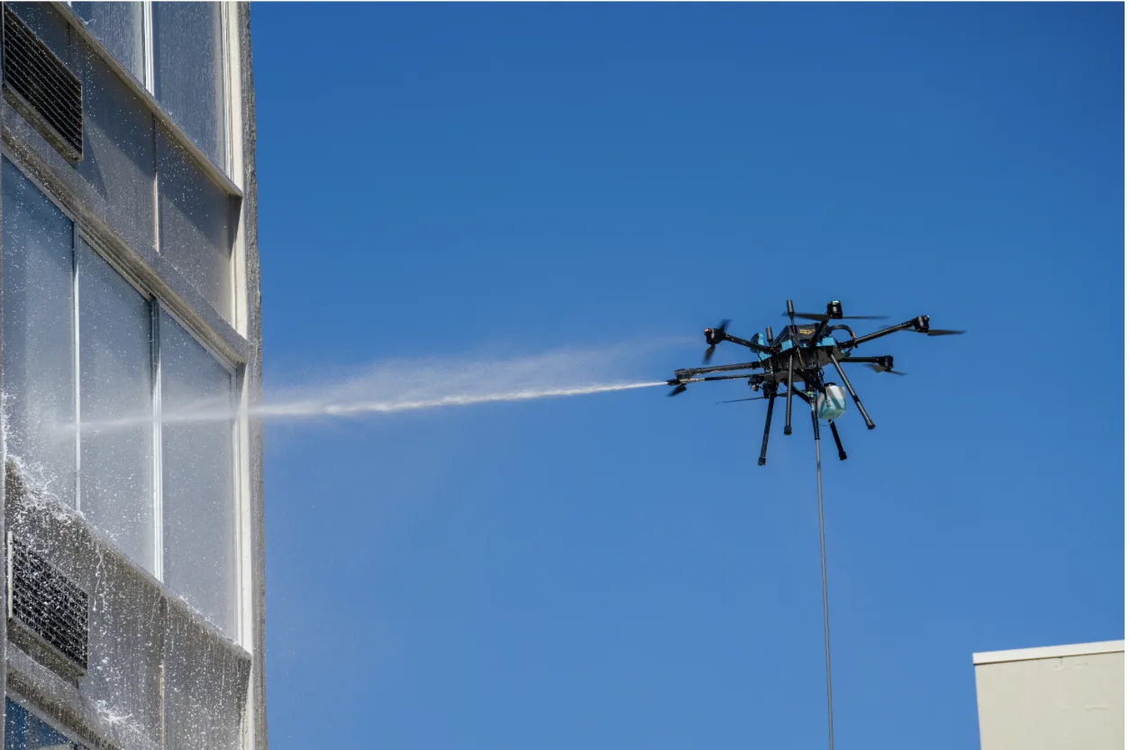 Tethered cleaning drone in flight, the equipment behind every price on this page